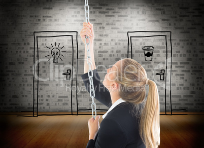 Composite image of businesswoman pulling a chain