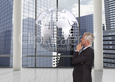 Composite image of thoughtful mature businessman posing