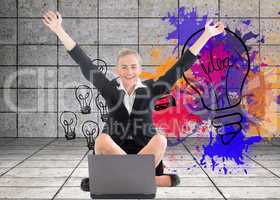 Composite image of businesswoman sitting in front of laptop with