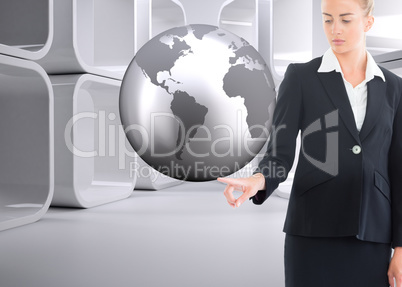 Composite image of businesswoman pointing somewhere