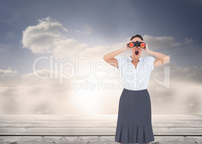 Composite image of shocked elegant businesswoman looking through