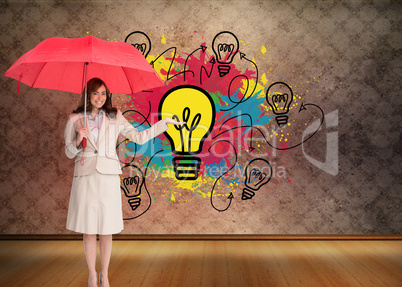 Composite image of happy businesswoman holding umbrella