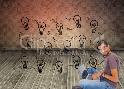 Composite image of man wearing glasses sitting on floor using la