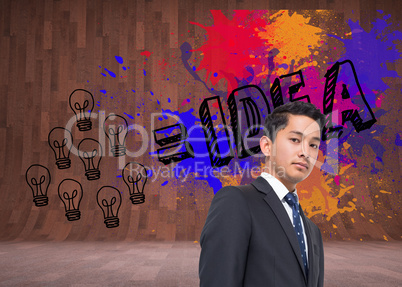 Composite image of idea on splashes on dark wooden wall