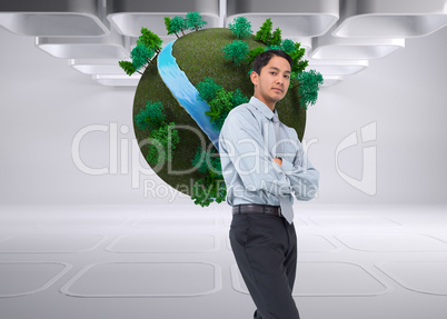 Composite image of serious asian businessman