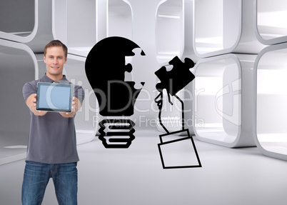 Composite image of young man showing screen of his tablet comput