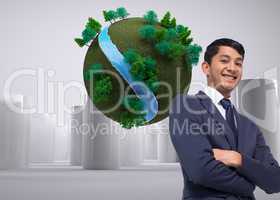 Composite image of smiling asian businessman with arms crossed