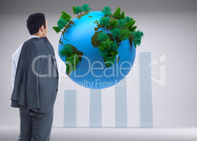 Composite image of businessman standing