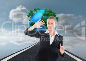 Composite image of businesswoman pointing somewhere