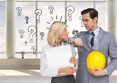 Composite image of architects with plans and hard hat looking at