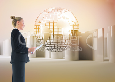 Composite image of businesswoman holding new tablet