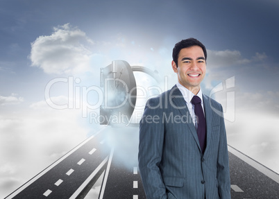 Composite image of smiling businessman standing