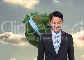 Composite image of smiling asian businessman