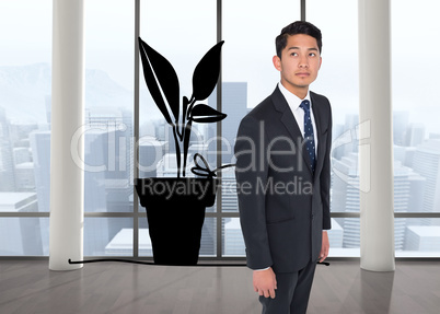 Composite image of serious asian businessman