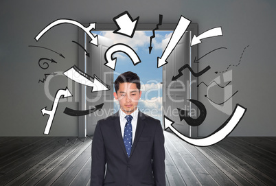 Composite image of stern businessman looking at camera