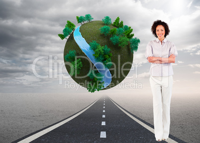 Composite image of businesswoman with crossed arms