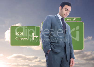 Composite image of unsmiling businessman standing