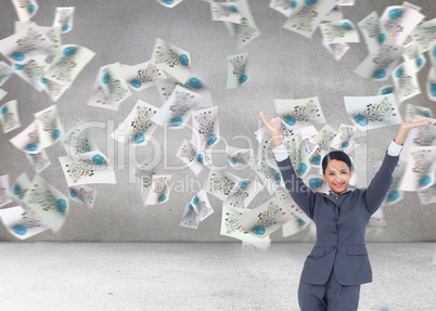 Composite image of cheering businesswoman