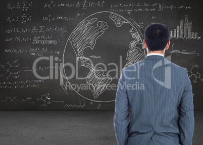 Composite image of businessman standing