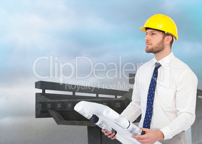 Composite image of thoughtful young architect posing