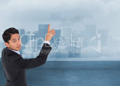 Composite image of stern asian businessman pointing