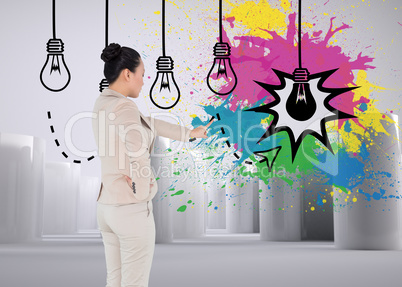 Composite image of unsmiling asian businesswoman pointing