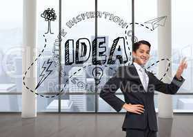 Composite image of smiling asian businessman pointing