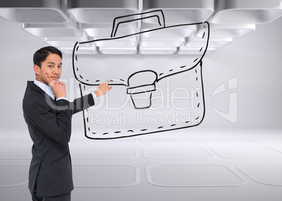 Composite image of thoughtful asian businessman pointing