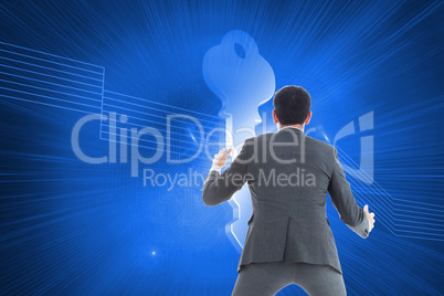 Composite image of businessman catching