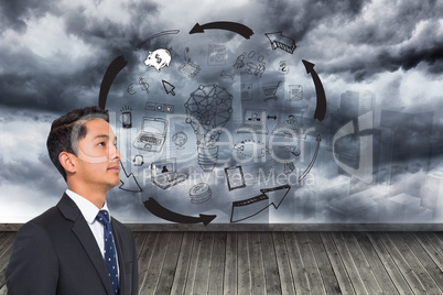 Composite image of graphic on wall with stormy sky