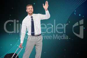 Composite image of handsome businessman with suitcase waving