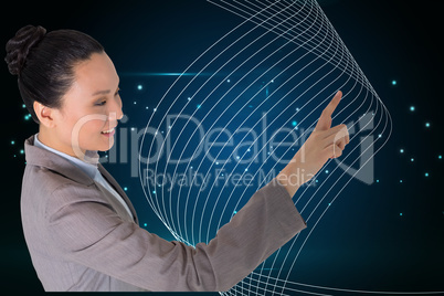 Composite image of smiling asian businesswoman pointing