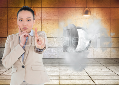 Composite image of thoughtful asian businesswoman pointing