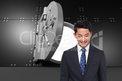 Composite image of smiling asian businessman