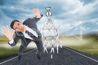 Composite image of unsmiling businessman with arms raised