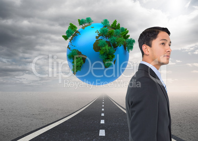 Composite image of serious asian businessman Composite image of serious asian businessman