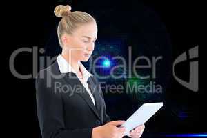 Composite image of businesswoman holding tablet