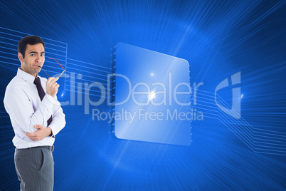 Composite image of thinking businessman holding glasses