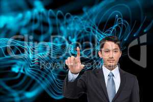 Composite image of stern asian businessman pointing