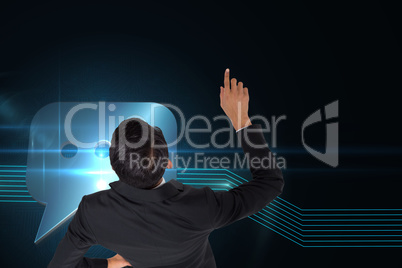 Composite image of asian businessman pointing