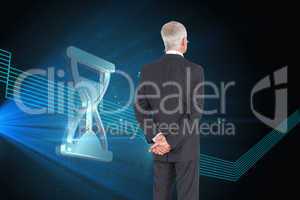 Composite image of rear view of mature businessman posing