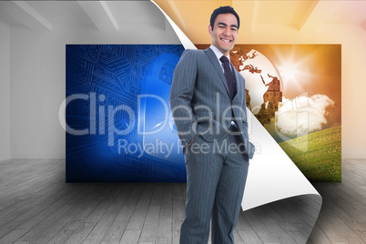 Composite image of smiling businessman standing