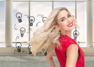 Composite image of smiling blonde standing hands on hips