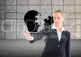 Composite image of businesswoman pointing somewhere