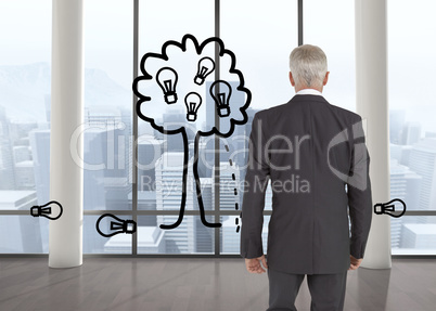 Composite image of businessman walking away from camera