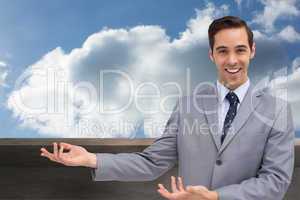 Composite image of young businessman presenting something