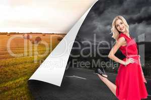 Composite image of smiling blonde standing hands on hips