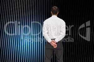 Composite image of businessman turning his back to camera