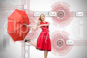 Composite image of elegant blonde holding umbrella