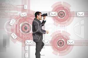 Composite image of businessman standing on ladder